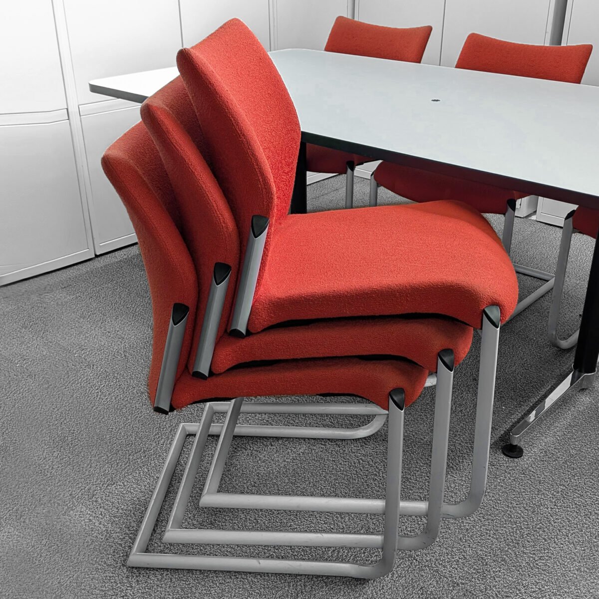 Round Meeting Table & 3 Stacking Meeting Orange Chairs - Image 3